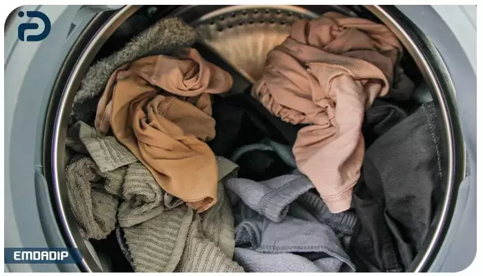 بارگیری بیش از حد مجاز از عوامل کند چرخیدن دیگ ماشین لباسشویی